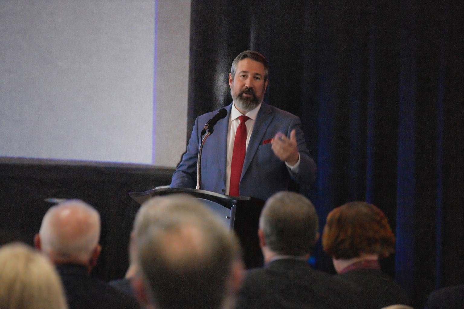 Landon Taylor Nelson: Leadership Speaker Landon Taylor Nelson speaking at a corporate leadership conference on formation and human flourishing